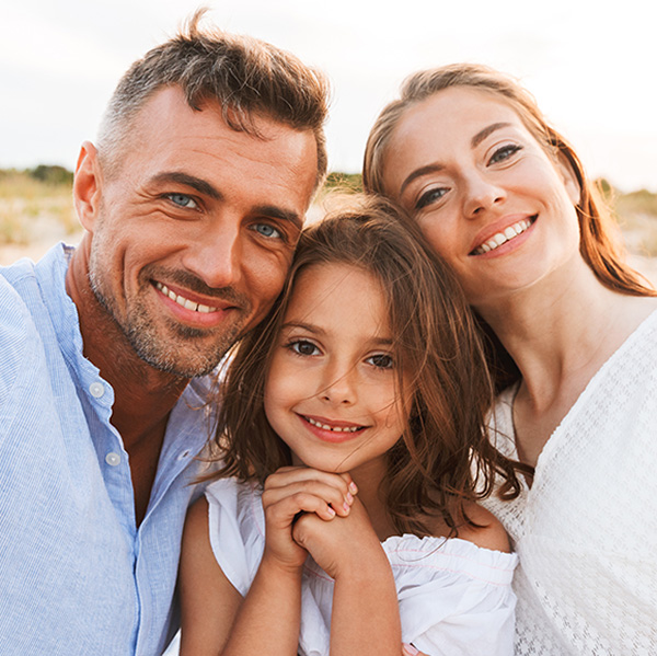 Smiling_dentist_in_Bradenton_Florida_dental_office_ready_for_appointments